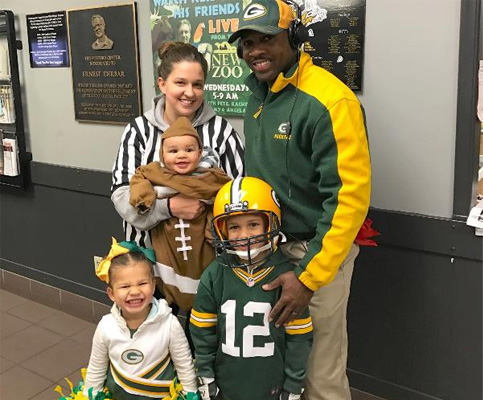 family-with-packers-coach